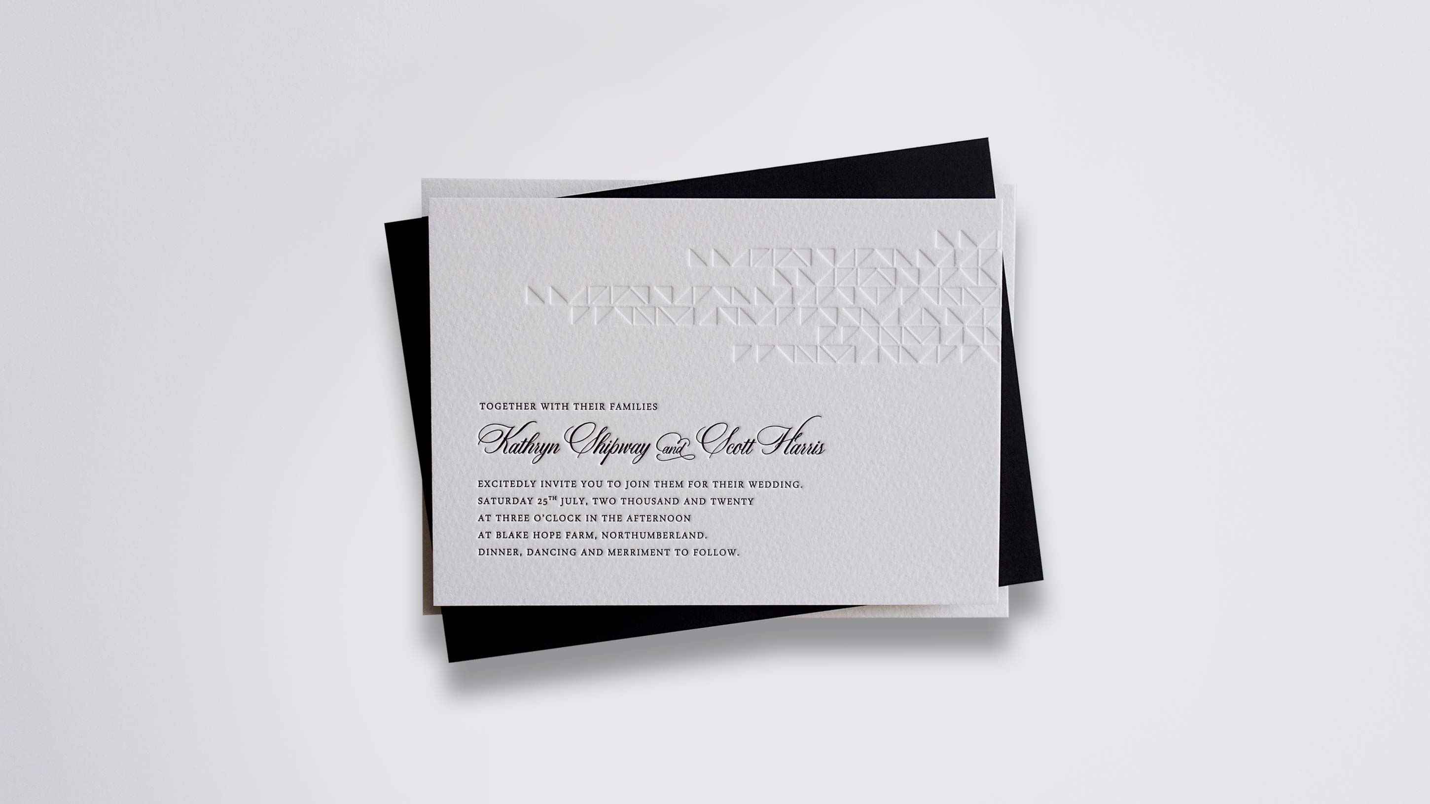 Zoe letterpress wedding stationery with Black & Blind letterpress detail on Warm White board