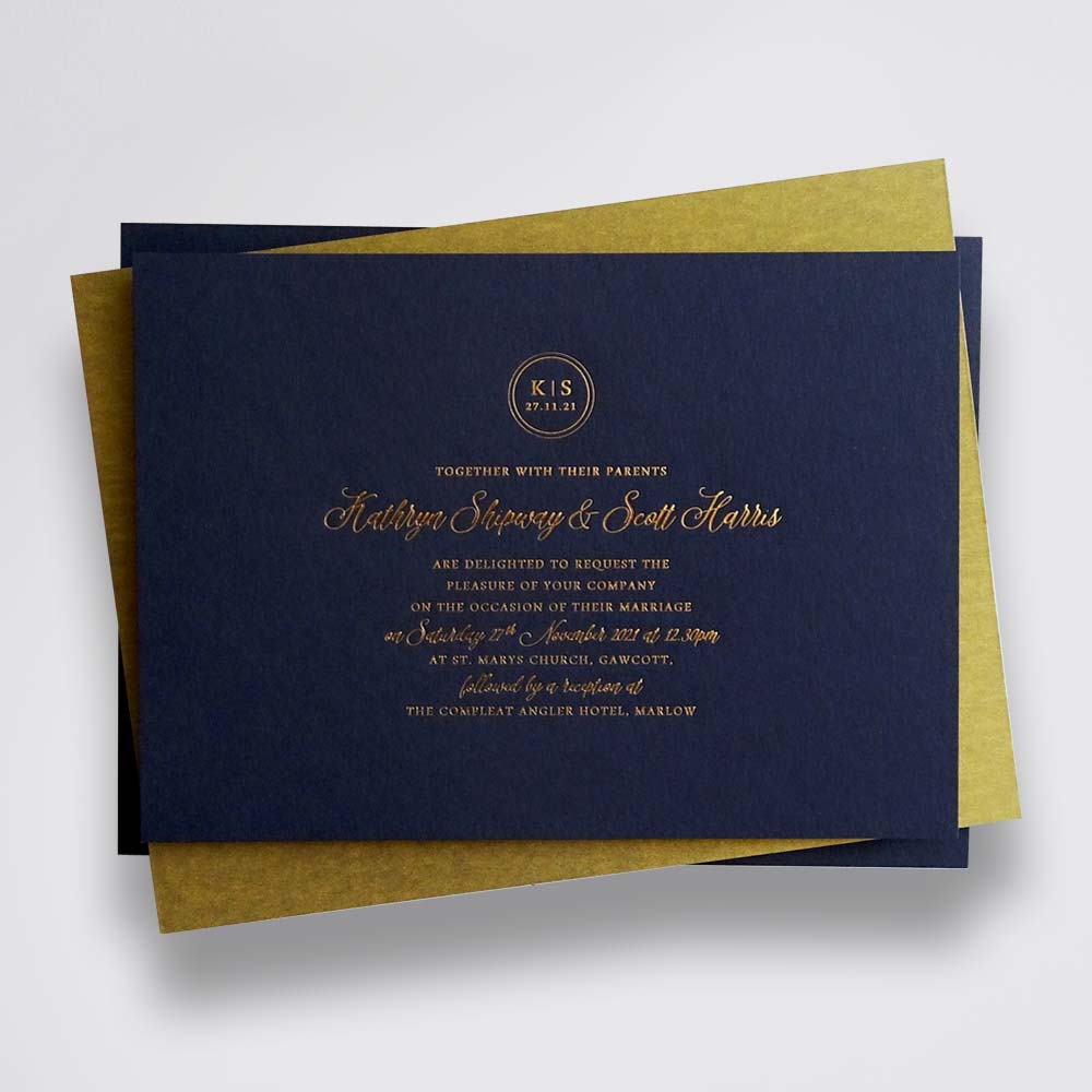 Isla gold foil on dark blue wedding invitation
