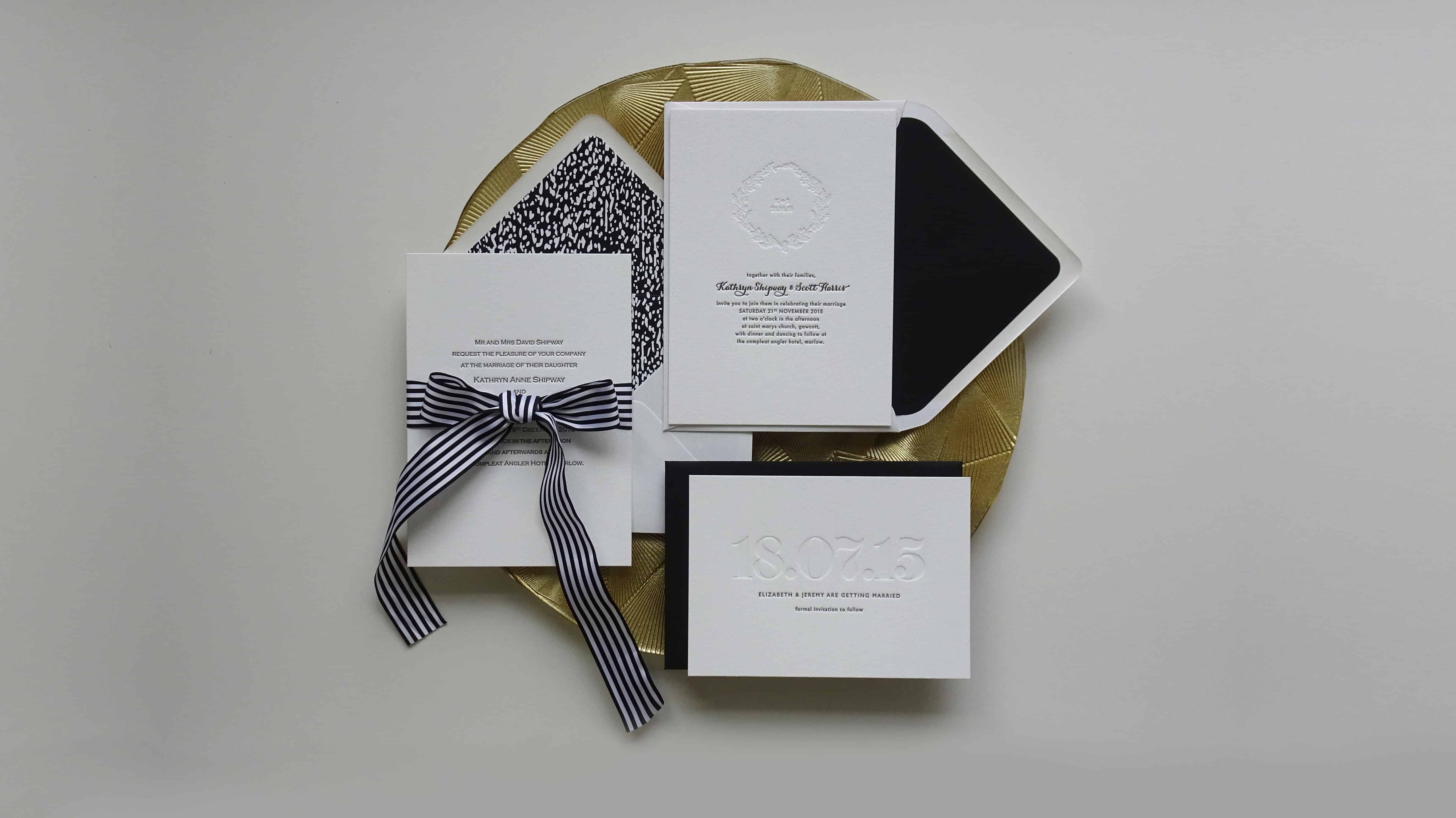 letterpress wedding stationery, shown with ribbon and envelope liners, blind and black